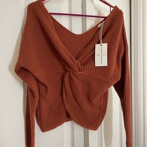 Cross body sweater